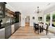 Eat in kitchen features custom backsplash, wet bar, stainless appliances, and breakfast nook at 3925 Sheldon Ne Dr, Atlanta, GA 30342