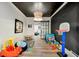 Playroom features wood floors, neutral color scheme, recessed lights, and ample area for recreation at 3925 Sheldon Ne Dr, Atlanta, GA 30342