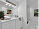 Bathroom featuring updated vanity, mirror and tiled floors at 82 Vanessa Se Dr, Smyrna, GA 30082