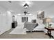Spacious main bedroom with decorative touches, ceiling fan, and natural light at 82 Vanessa Se Dr, Smyrna, GA 30082