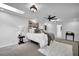 Spacious main bedroom featuring ceiling fan, modern decor, and natural light at 82 Vanessa Se Dr, Smyrna, GA 30082