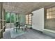 Relaxing screened porch with neutral furniture and a serene outdoor view at 82 Vanessa Se Dr, Smyrna, GA 30082