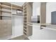 Spacious walk-in closet has custom shelving and storage solutions for organization at 82 Vanessa Se Dr, Smyrna, GA 30082
