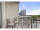 Cozy balcony with seating and a view of the city skyline at 943 Peachtree Ne St # 716, Atlanta, GA 30309