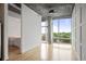 Open bedroom with floor to ceiling windows and hardwood floors at 943 Peachtree Ne St # 716, Atlanta, GA 30309
