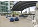 Beautiful outdoor patio area with plush lounge seating and grilling station, perfect for entertaining and relaxation at 943 Peachtree Ne St # 716, Atlanta, GA 30309