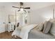 Bright bedroom with a four poster bed, wood floors and bright natural light at 221 Brooke Dr., Alpharetta, GA 30009