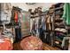 A large walk-in closet featuring custom shelving for maximum storage at 221 Brooke Dr., Alpharetta, GA 30009
