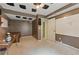 The basement features dark brown walls, sound-dampening tiles on the ceiling, and a blank white board at 4585 Muirwood Cir, Powder Springs, GA 30127