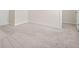 Bright bedroom featuring neutral carpet and white trim at 603 River Gardens Se Dr, Atlanta, GA 30354