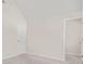 Bedroom featuring vaulted ceiling and walk-in closet at 603 River Gardens Se Dr, Atlanta, GA 30354
