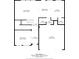 First floor plan featuring a living room, kitchen, dining area, sitting room, foyer, and garage at 603 River Gardens Se Dr, Atlanta, GA 30354