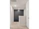 Hallway with neutral carpet, a statement black accent wall, and recessed lighting at 603 River Gardens Se Dr, Atlanta, GA 30354