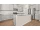 Kitchen featuring gray cabinetry, granite counters, and stainless steel appliances at 603 River Gardens Se Dr, Atlanta, GA 30354