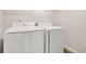 Laundry room featuring a new washer and dryer at 603 River Gardens Se Dr, Atlanta, GA 30354