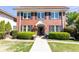 Charming brick two-story home with manicured lawn and inviting entryway at 824 Greenwood Ne Ave # 9, Atlanta, GA 30306
