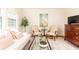 Cozy living room with comfortable seating, stylish rug, and a serene aesthetic at 824 Greenwood Ne Ave # 9, Atlanta, GA 30306