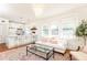 Open-concept living space with modern kitchen, cozy seating, and abundant natural light at 824 Greenwood Ne Ave # 9, Atlanta, GA 30306