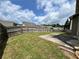 Spacious backyard featuring a fenced-in yard and concrete patio, perfect for outdoor entertaining and relaxation at 3522 Fallen Oak Dr, Buford, GA 30519
