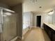 Bathroom with separate shower, tub, and double vanity at 3522 Fallen Oak Dr, Buford, GA 30519