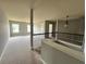 Carpeted upstairs landing with neutral paint at 3522 Fallen Oak Dr, Buford, GA 30519