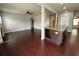 Open concept kitchen and living area with hardwood floors, stainless steel appliances and great flow at 3522 Fallen Oak Dr, Buford, GA 30519