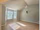 Bright living room featuring vaulted ceilings, modern light fixture, and large windows at 4284 Caroline Ct, Douglasville, GA 30135