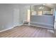 Open living area featuring wood floors, access to the eat-in kitchen and stairs to another level at 4284 Caroline Ct, Douglasville, GA 30135