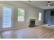 Spacious living room with wood floors, fireplace, and neutral colors at 4284 Caroline Ct, Douglasville, GA 30135