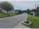 Street view of a neighborhood with well-maintained lawns and 'For Sale' sign at 4284 Caroline Ct, Douglasville, GA 30135