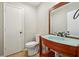 Modern bathroom with a unique vanity, updated fixtures, and neutral wall color at 6100 Blackwater Trl, Atlanta, GA 30328