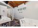 Relaxing bathroom with a soaking tub, shower, and double sinks at 6100 Blackwater Trl, Atlanta, GA 30328