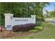 North Harbor entrance with brick columns, manicured landscaping, and clear signage at 6100 Blackwater Trl, Atlanta, GA 30328