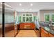 Bright kitchen featuring granite countertops, stainless steel appliances, and wood cabinets at 6100 Blackwater Trl, Atlanta, GA 30328