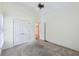 Bedroom featuring carpet and a closet with double doors at 8110 Lakemont Close, Mcdonough, GA 30253