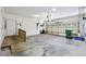 This garage boasts ample space, natural light, and a ramp for easy access at 8110 Lakemont Close, Mcdonough, GA 30253