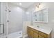 Bathroom featuring a glass-enclosed shower and a single vanity at 8110 Lakemont Close, Mcdonough, GA 30253