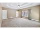 Spacious carpeted main bedroom with ensuite bathroom and natural light at 8110 Lakemont Close, Mcdonough, GA 30253