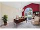 Bright office featuring a chandelier, large window, and ample workspace at 8110 Lakemont Close, Mcdonough, GA 30253