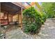 Outdoor patio with brick path next to lush landscaping at 8110 Lakemont Close, Mcdonough, GA 30253
