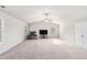 Expansive bonus room features plush carpeting, a ceiling fan and natural light at 10137 Cormac St, Jonesboro, GA 30238