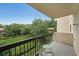 Private balcony with chairs overlooking the lush, green landscaping at 1800 Clairmont Lk # 313, Decatur, GA 30033