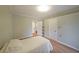 Bright bedroom featuring hardwood floors, two closets, and a neutral color scheme at 1800 Clairmont Lk # 313, Decatur, GA 30033