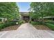 Entrance to building at 2100 Clairmont with a brick walkway, landscaping, and brick facade at 1800 Clairmont Lk # 313, Decatur, GA 30033