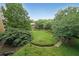 Overhead view of the manicured lawn and landscaping in the community at 1800 Clairmont Lk # 313, Decatur, GA 30033