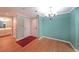 Welcoming hallway with a view of a well-lit bathroom and ample closet space at 1800 Clairmont Lk # 313, Decatur, GA 30033