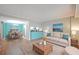 Bright living room with modern furniture and a view of the dining area and kitchen at 1800 Clairmont Lk # 313, Decatur, GA 30033