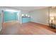 Open-concept living and dining areas with a glimpse of the well-appointed kitchen at 1800 Clairmont Lk # 313, Decatur, GA 30033