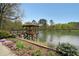 Pier overlooking a lake and garden at Clairmont Place, providing a scenic and serene environment at 1800 Clairmont Lk # 313, Decatur, GA 30033