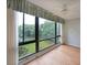 This bright room boasts floor-to-ceiling windows with views of mature trees at 1800 Clairmont Lk # 313, Decatur, GA 30033